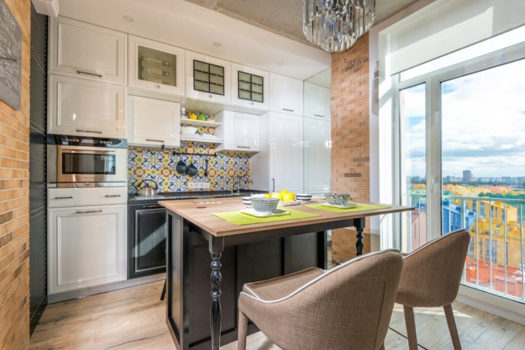 a kitchen with wooden floors.